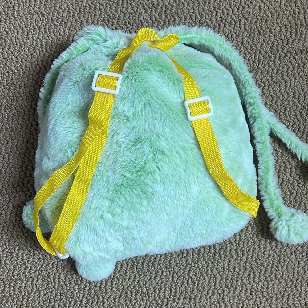 Frog backpack blanket. Very cute and soft.